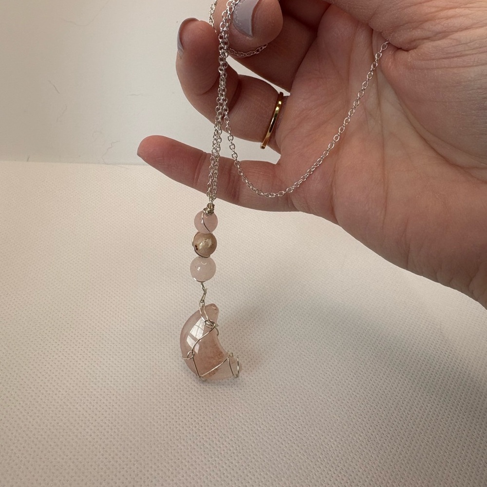 Silver wire wrapped quartz moon necklace